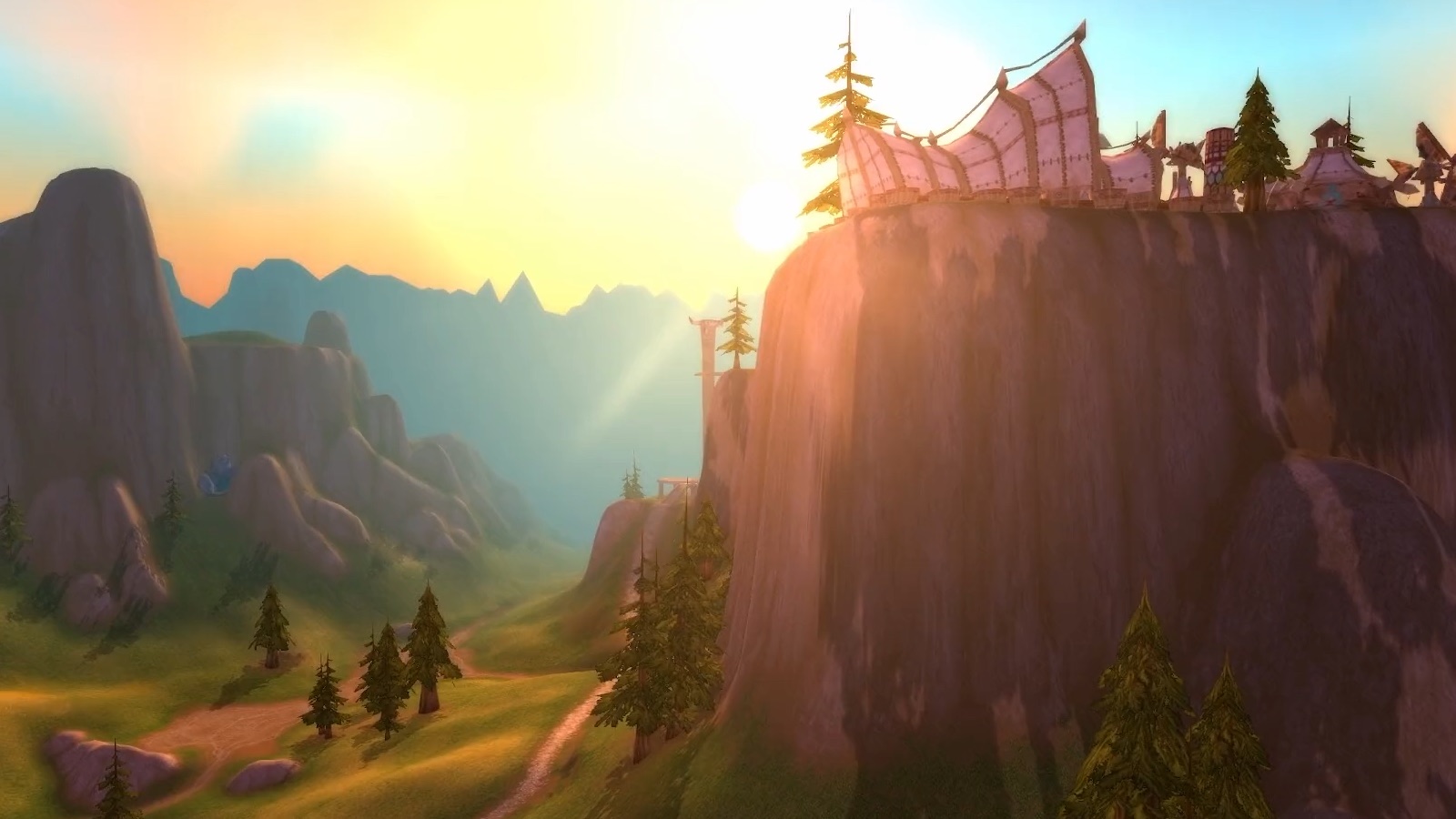 Mulgore — Mulgore mesa with tauren structures: the mountain now casts shadows and light shafts through the haze. — Classic